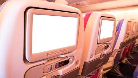 Airline seats representing the perks of getting the best seats on the plane