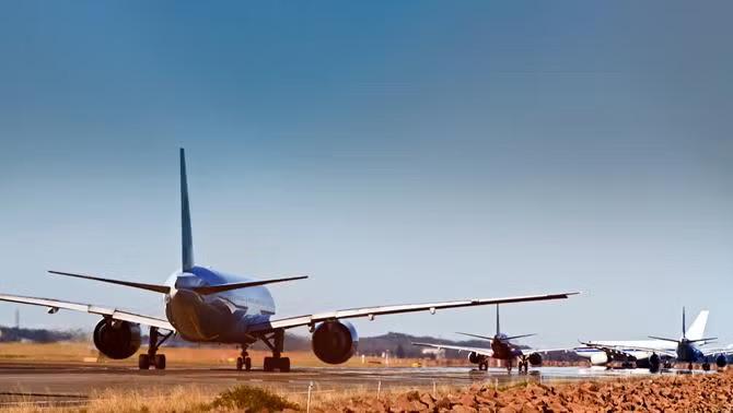 Airplane on the runway representing top holiday hacks.